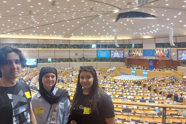 1007-Hemicycle3 red Marcos Gutierrez, Lauryn Williame and Konstantina Loukani at the European Parliament