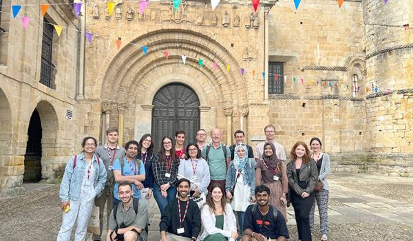 Group picture of the participants of the summer school, during an extra activity