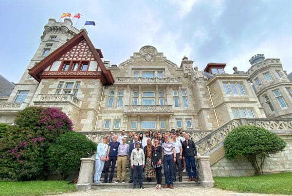 Group picture of the participants of the summer school, posing in front of the Magdalena Palace, in Spain