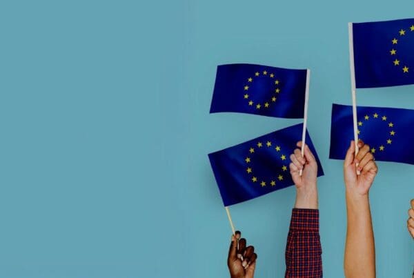 hands holding flags of the European Union